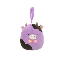 Squishmallows Przypinka fioletowo-czarna krowa z muszką Alexie, 9 cm